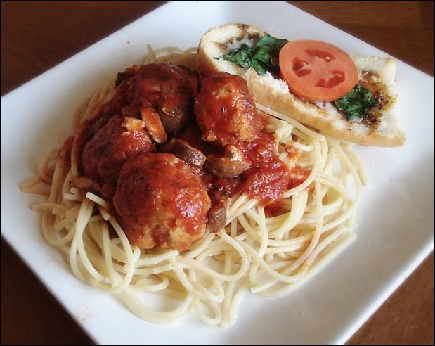 spaghetti with (ground TURKEY!) meatballs in a homemade sauce and Italian bread on the side!